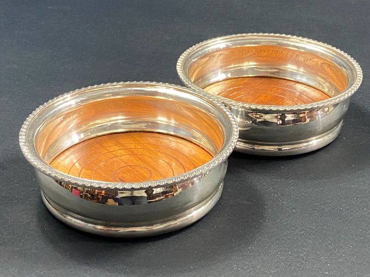 Pair of Louis XV style silver-plated metal coasters