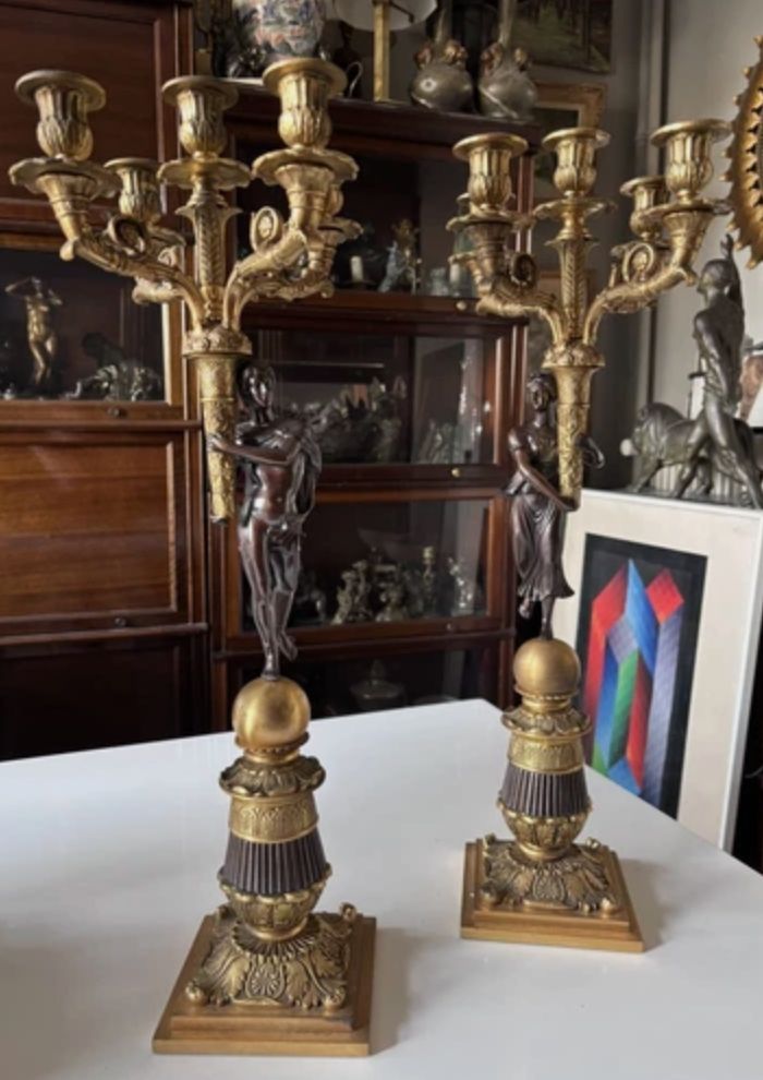 Pair of five-light bronze candelabra with double patina Empire or Restoration style