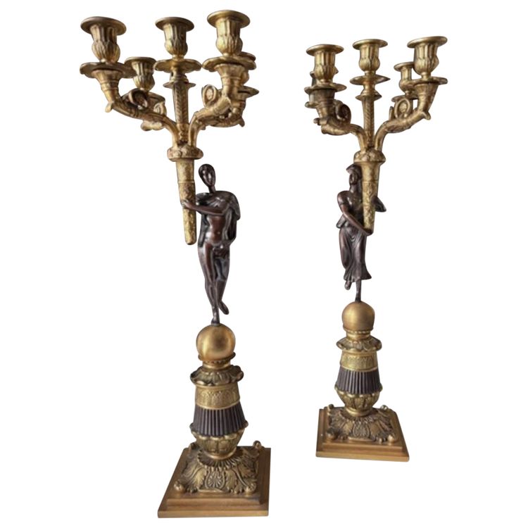 Pair of five-light bronze candelabra with double patina Empire or Restoration style