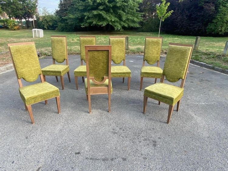 suite de 7 chaises art deco en chêne dans le style de Maurice Jallot, André Arbus, circa 1940