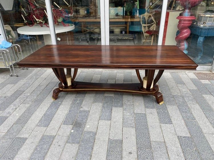 Baptistin Spade (1891-1969) elegant large Art Deco table in Macassar, parchment and bronze.