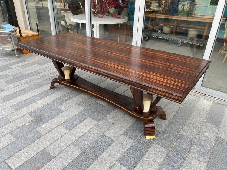 Baptistin Spade (1891-1969) elegant large Art Deco table in Macassar, parchment and bronze.
