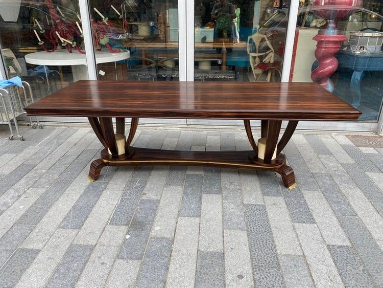 Baptistin Spade (1891-1969) elegant large Art Deco table in Macassar, parchment and bronze.