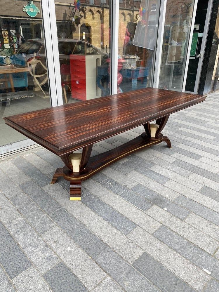 Baptistin Spade (1891-1969) elegant large Art Deco table in Macassar, parchment and bronze.