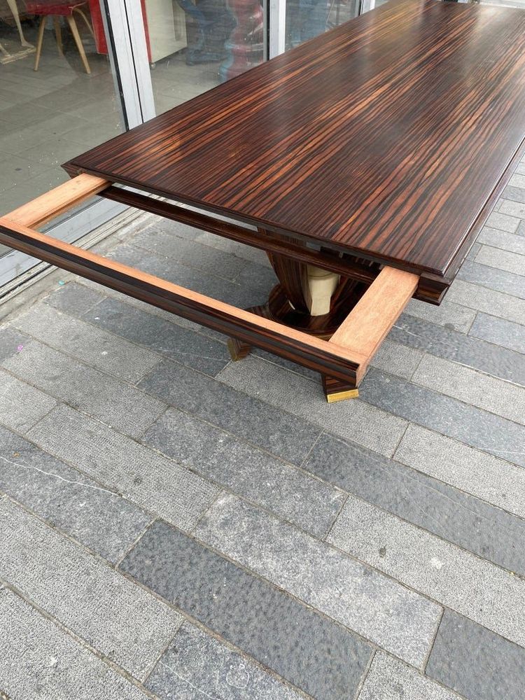 Baptistin Spade (1891-1969) elegant large Art Deco table in Macassar, parchment and bronze.