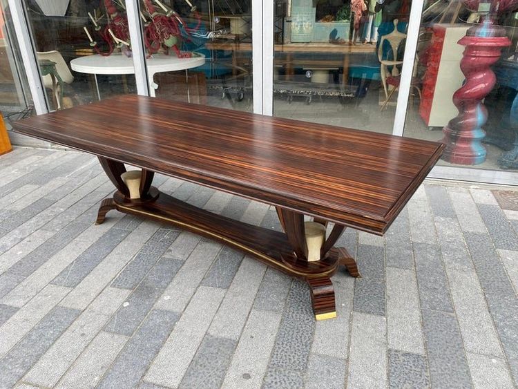 Baptistin Spade (1891-1969) elegant large Art Deco table in Macassar, parchment and bronze.