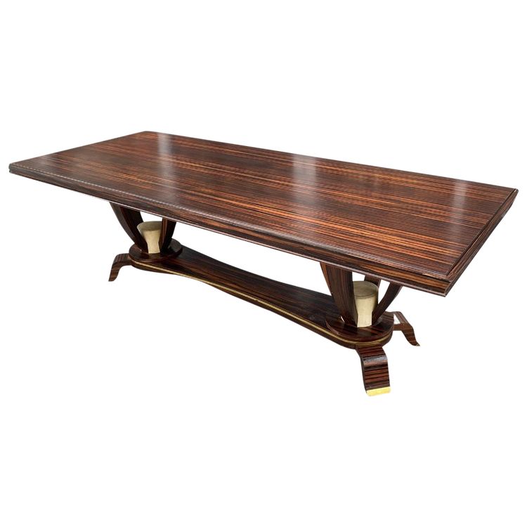 Baptistin Spade (1891-1969) elegant large Art Deco table in Macassar, parchment and bronze.