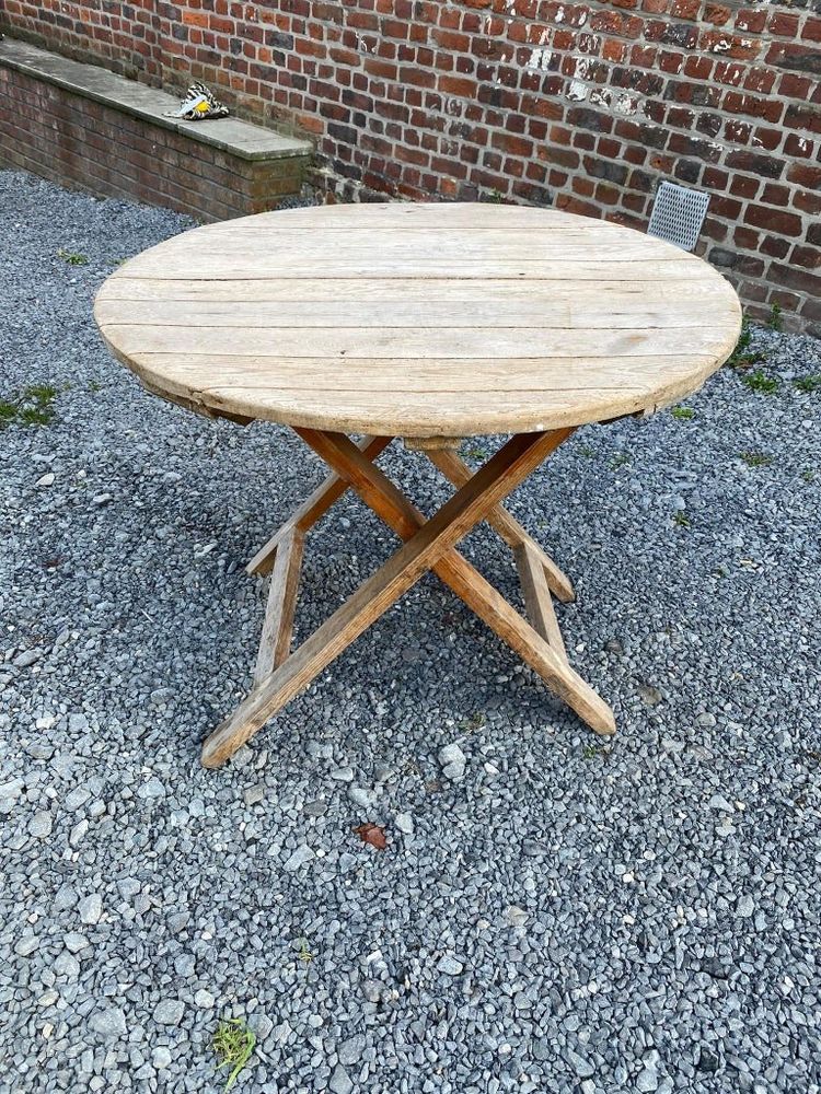 An antique 19th-century fir wood winemaker's table