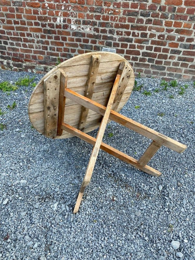 An antique 19th-century fir wood winemaker's table