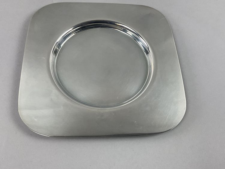 Pair of art deco silver-plated metal coasters