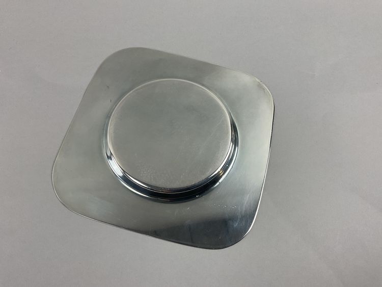 Pair of art deco silver-plated metal coasters
