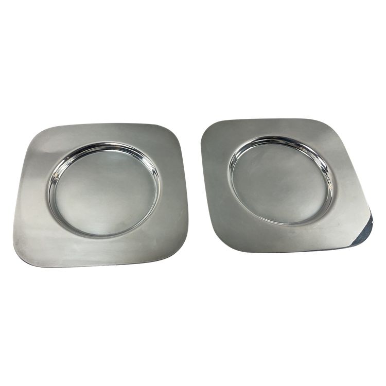 Pair of art deco silver-plated metal coasters