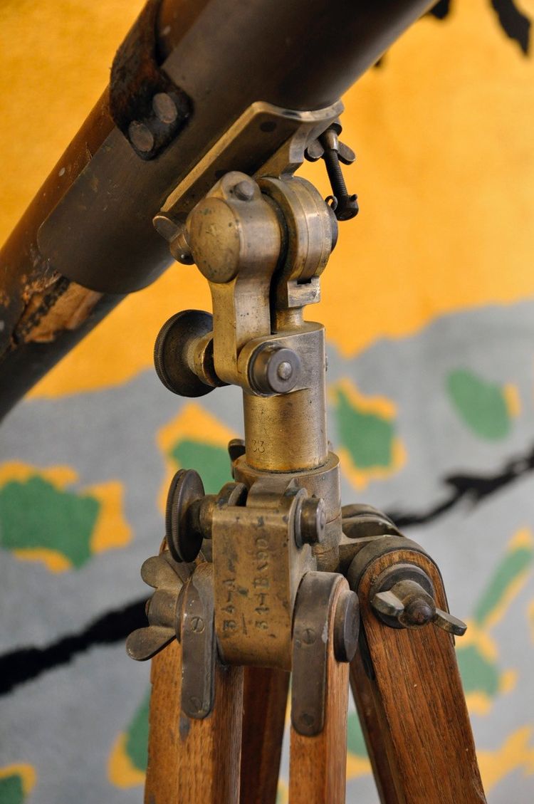 Blackened brass spyglass on wooden tripod 19th century period