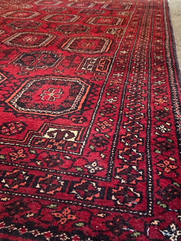 Tapis d'Orient Baloutche Boukhara laine réalisé main Afghanistan Turkménistan