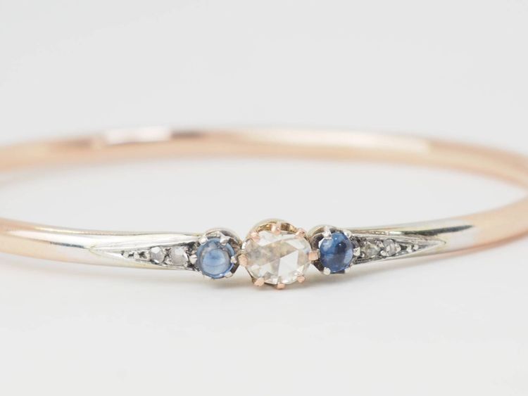 Art Nouveau bangle bracelet in two-tone gold, sapphires and diamonds