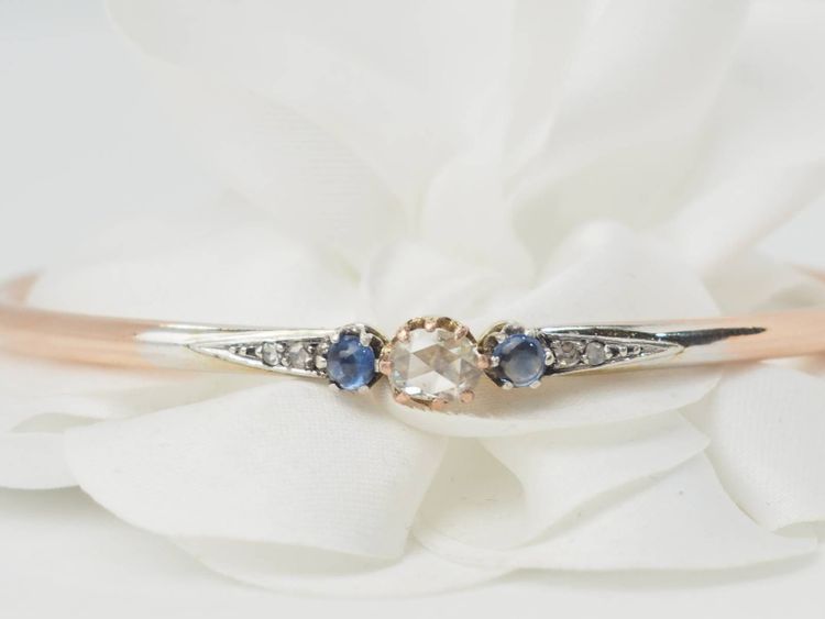 Art Nouveau bangle bracelet in two-tone gold, sapphires and diamonds