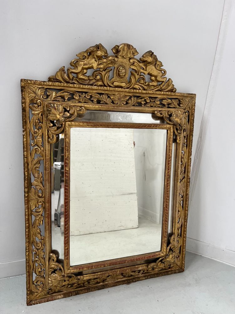 Miroir a pare closes de style Louis XIV en bois et stuc doré XIX siècle