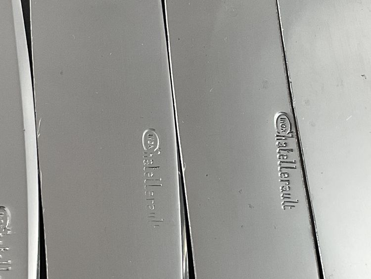 Seriöse Messer mit Perlmuttgriffen 