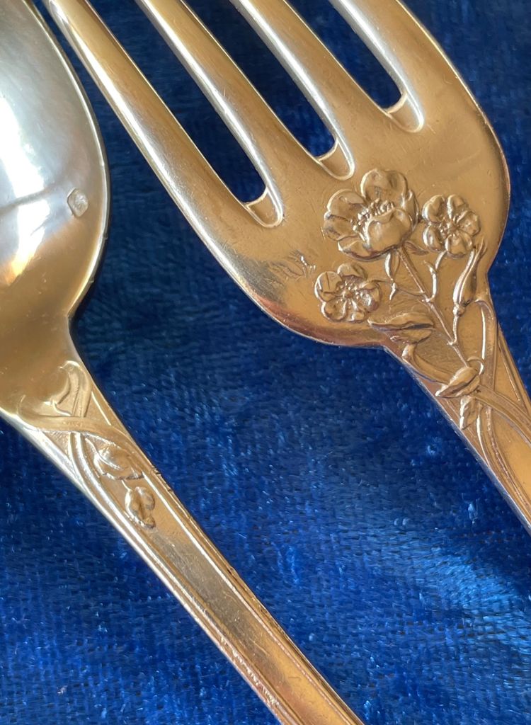 2 art nouveau place settings.