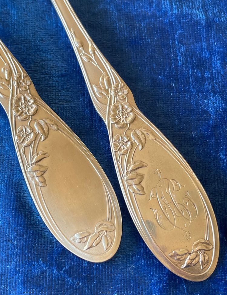 2 art nouveau place settings.