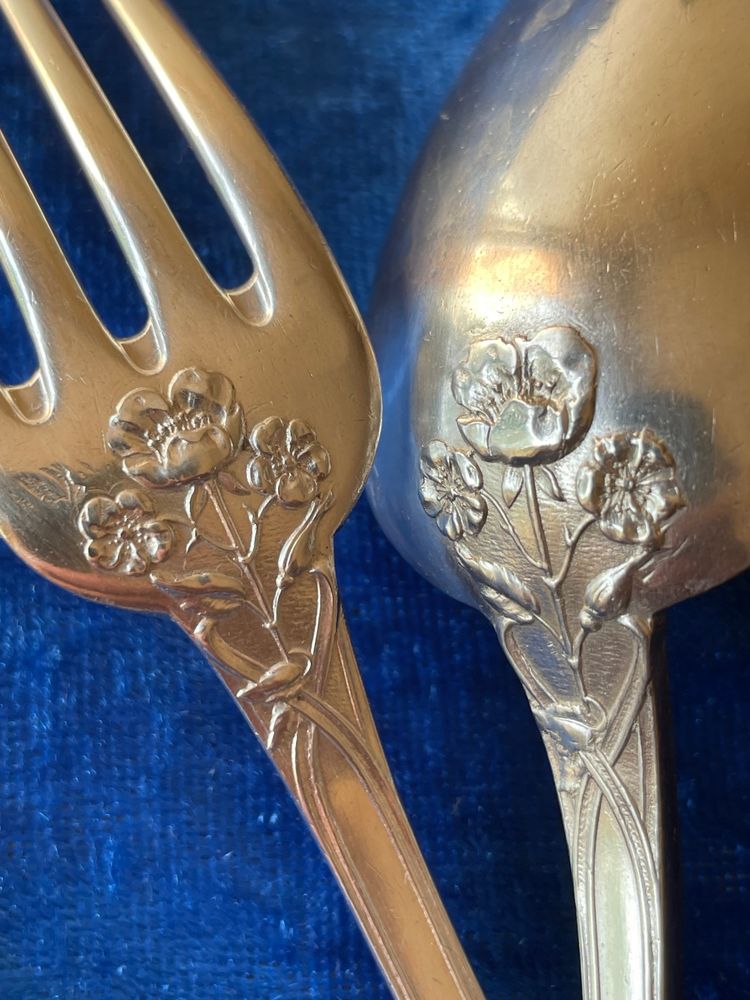 2 art nouveau place settings.