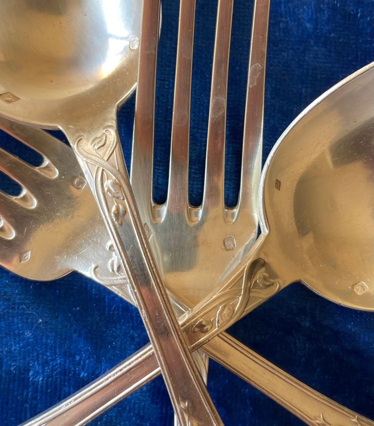 2 art nouveau place settings.