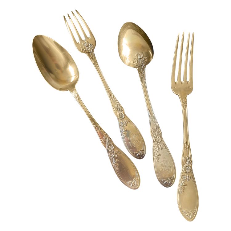 2 art nouveau place settings.