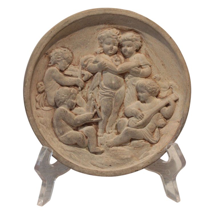 Médaillon en terre cuite 'Putti musiciens', travail italien,  fin 19ème siècle