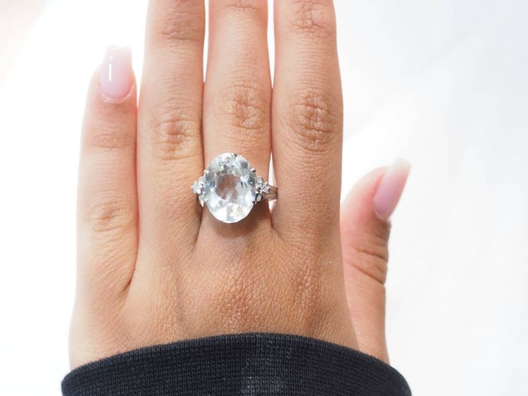 White gold, oval aquamarine and diamond ring