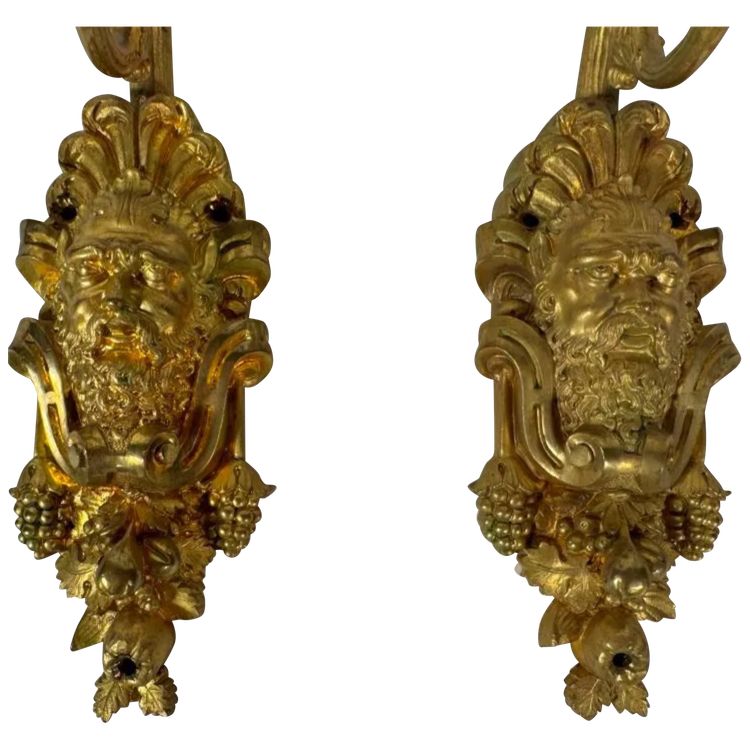 Pair of Louis XIV style sconces in chased ormolu Decorated with mascaron ( bacchus )
