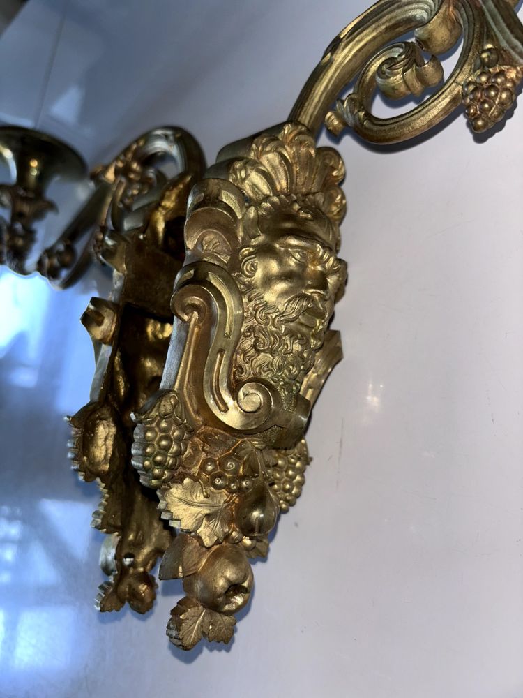 Pair of Louis XIV style sconces in chased ormolu Decorated with mascaron ( bacchus )