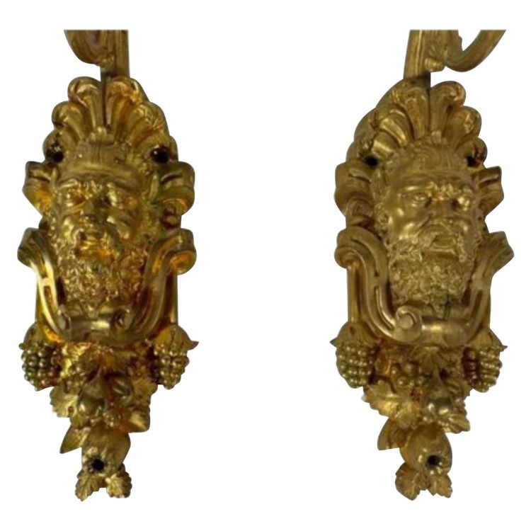 Pair of Louis XIV style sconces in chased ormolu Decorated with mascaron ( bacchus )
