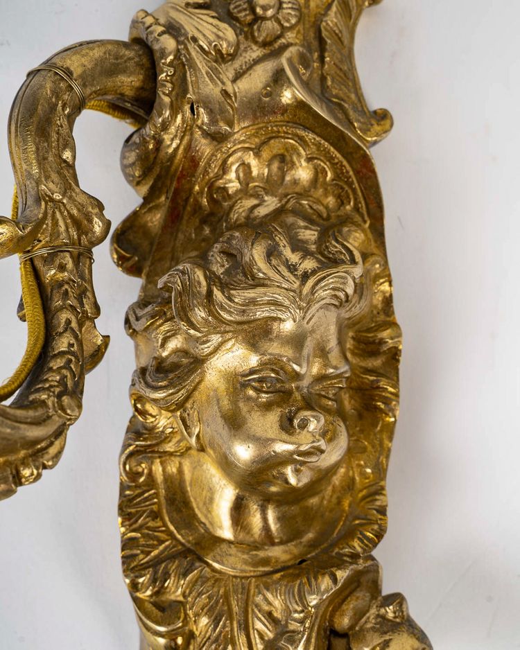 Paar Wandleuchten, genannt Aux Zéphyrs, aus ziselierter und vergoldeter Bronze XIX.