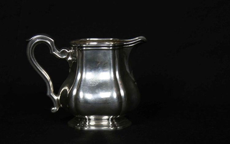 Served in solid silver tea, coffee and sugar pot