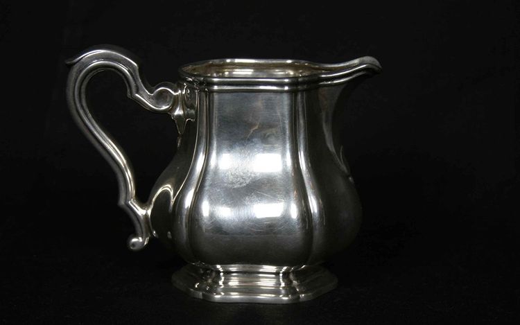 Served in solid silver tea, coffee and sugar pot