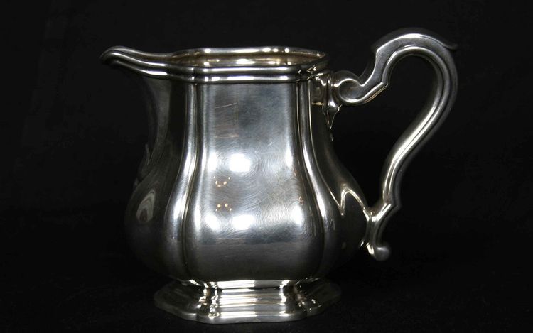 Served in solid silver tea, coffee and sugar pot