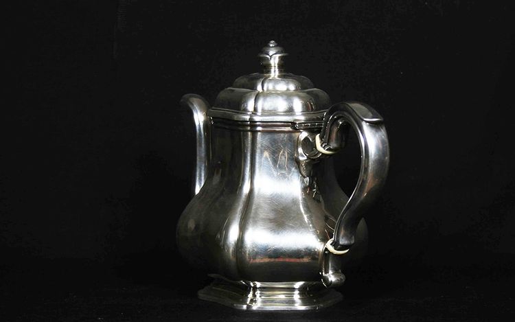 Served in solid silver tea, coffee and sugar pot