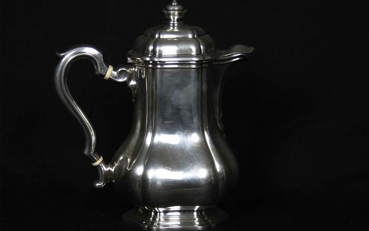 Served in solid silver tea, coffee and sugar pot