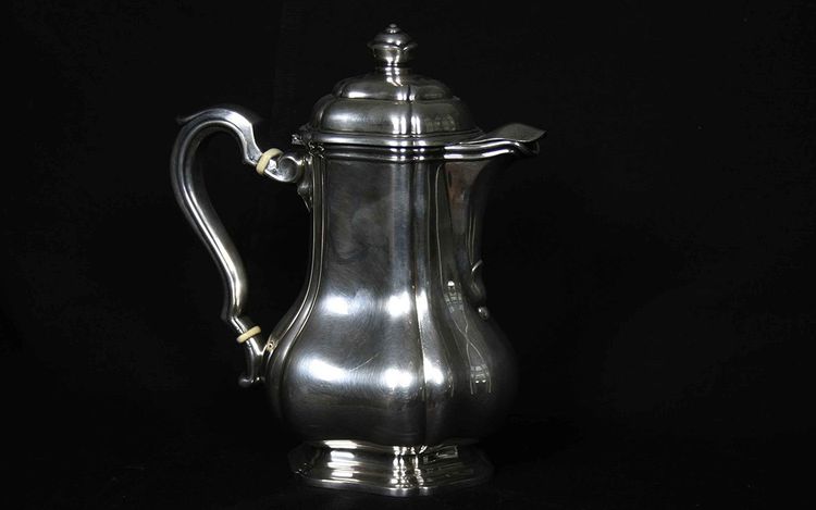 Served in solid silver tea, coffee and sugar pot