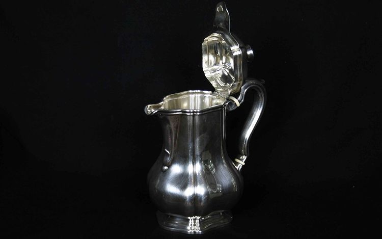 Served in solid silver tea, coffee and sugar pot