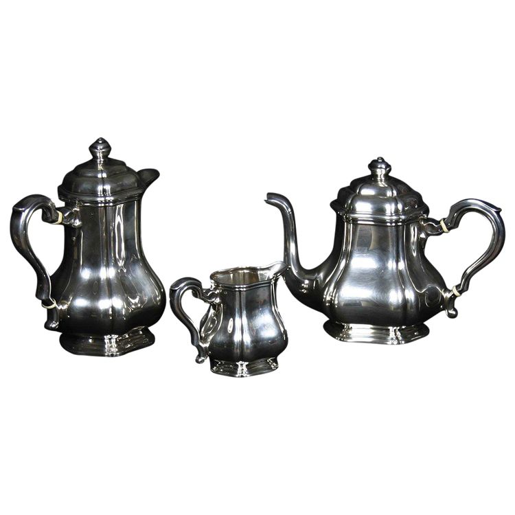 Served in solid silver tea, coffee and sugar pot