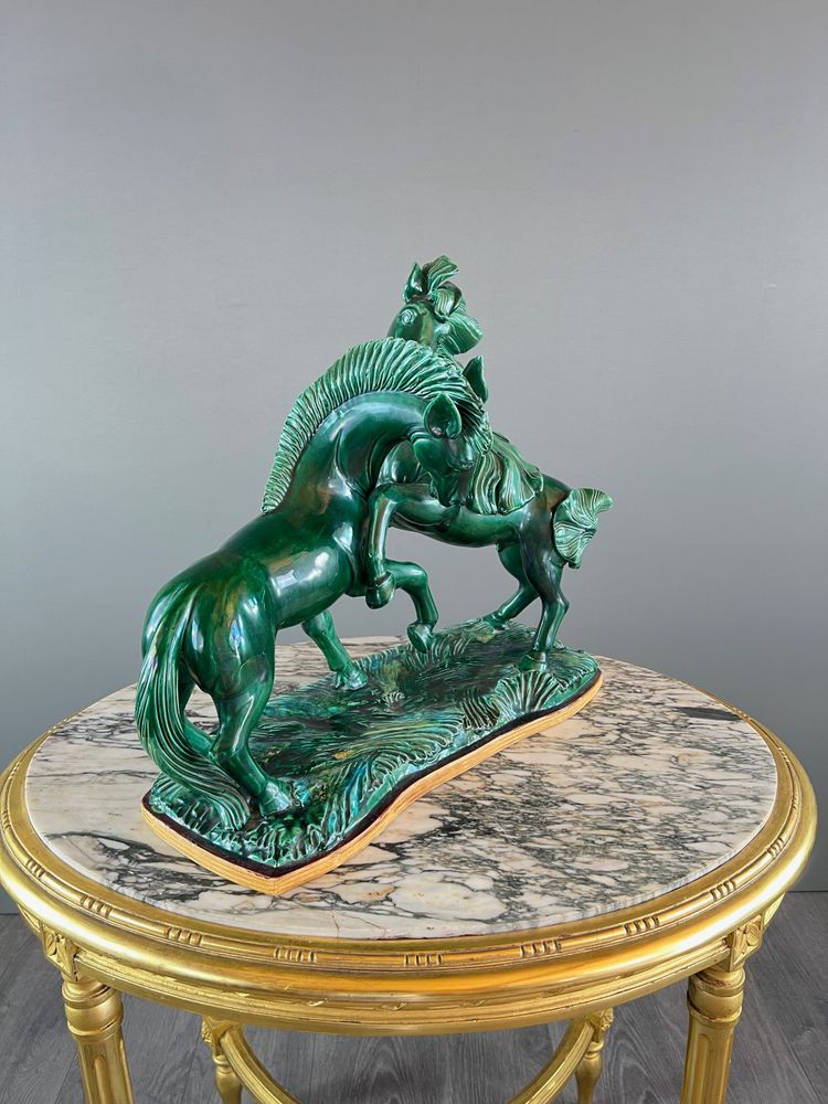 Scultura in ceramica smaltata, due cavalli, firmata R. Prunet, XX secolo