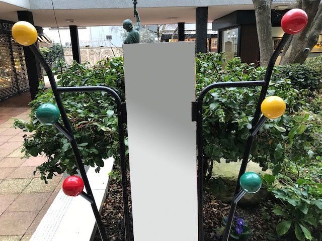 Black iron coat rack, 1970s, after Roger Ferraud