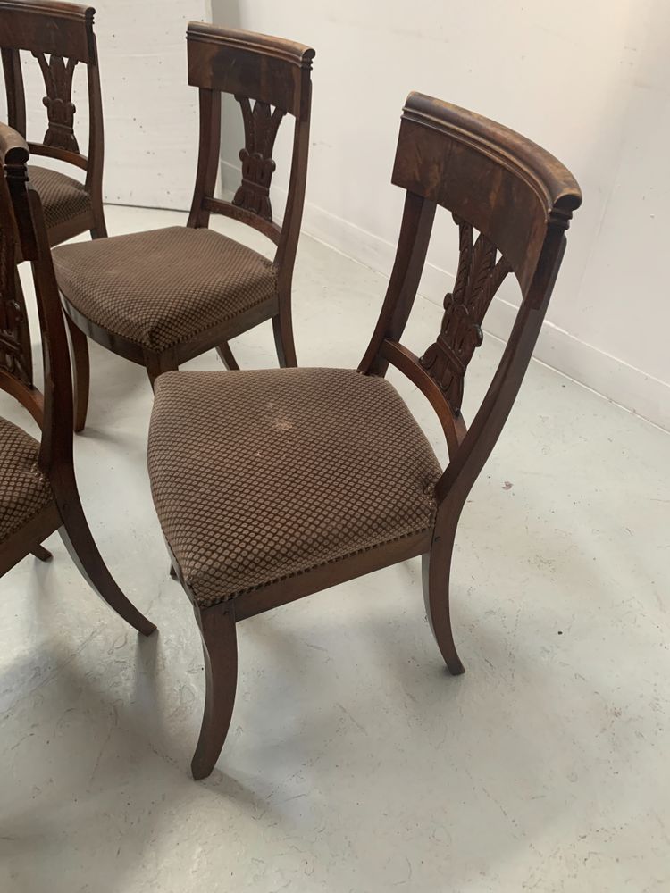 Suite of seven solid mahogany chairs XIX century