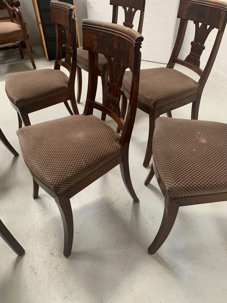 Suite of seven solid mahogany chairs XIX century
