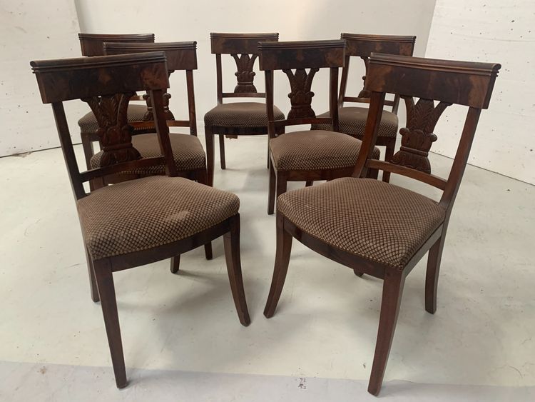 Suite of seven solid mahogany chairs XIX century