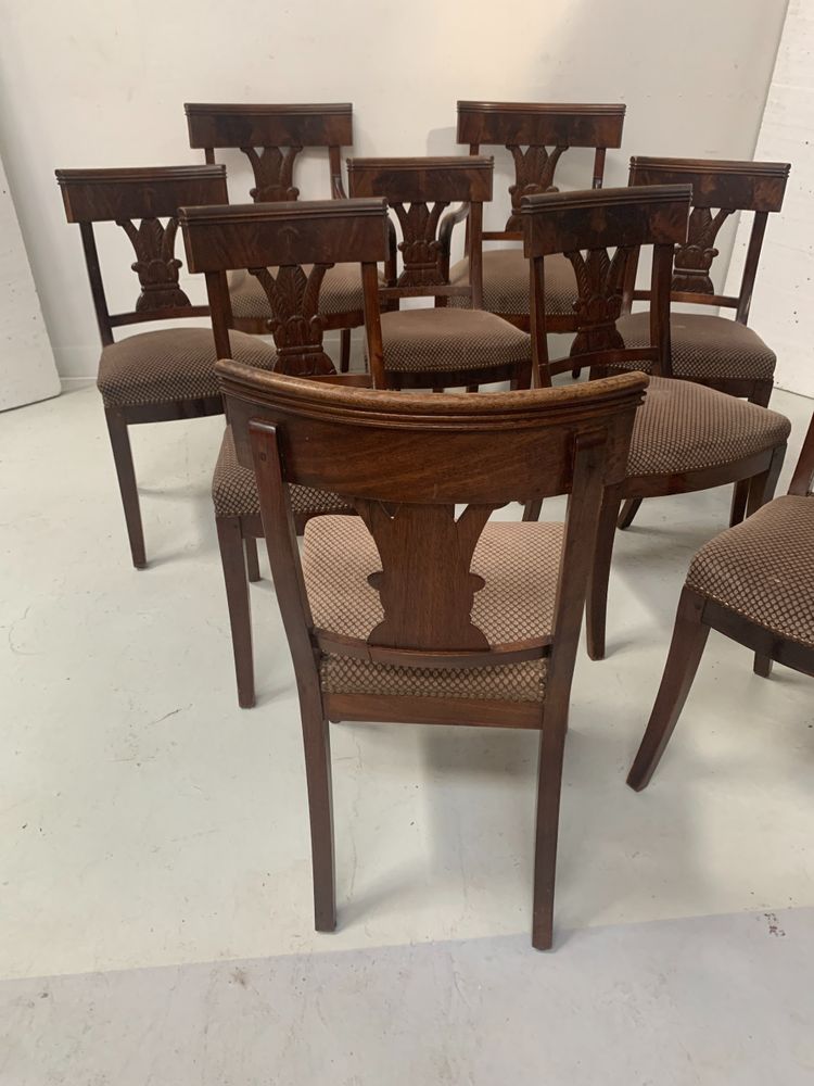 Suite of seven solid mahogany chairs XIX century