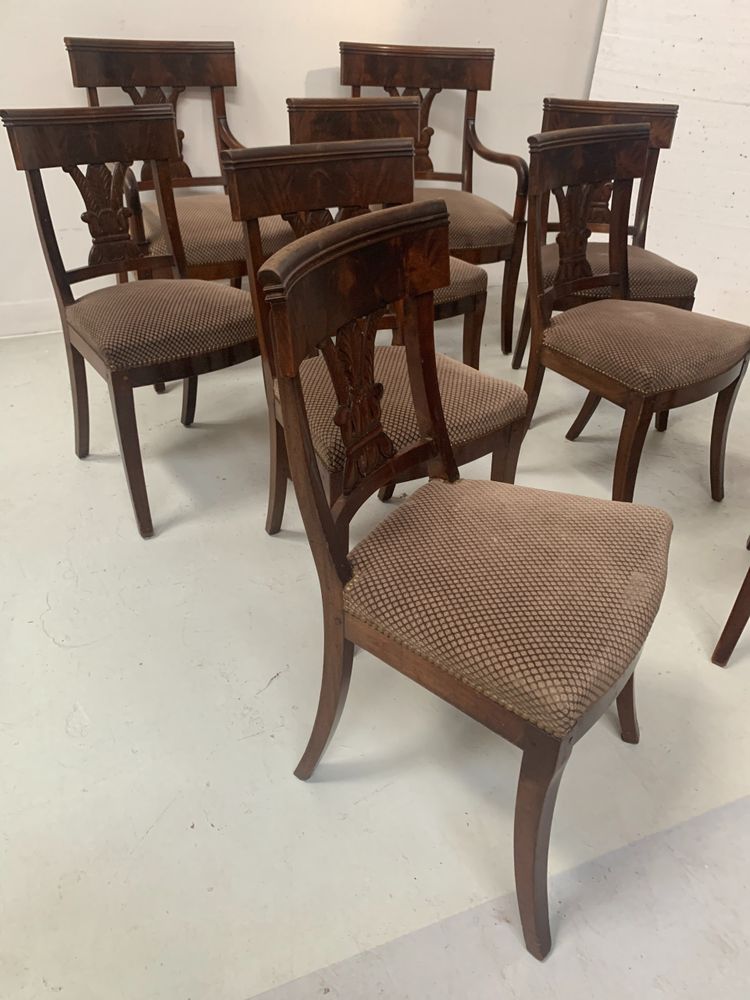 Suite of seven solid mahogany chairs XIX century