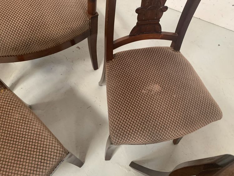 Suite of seven solid mahogany chairs XIX century