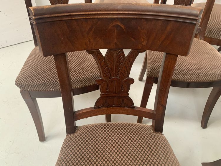 Suite of seven solid mahogany chairs XIX century
